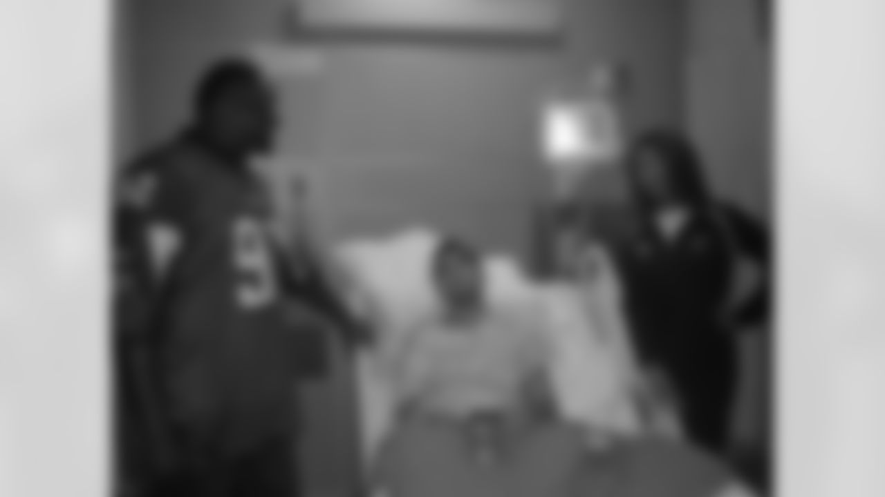 The Atlanta Facons visit Children's Healthcare of Atlanta // Atlanta, GA // Chauncey Davis visiting a patient //