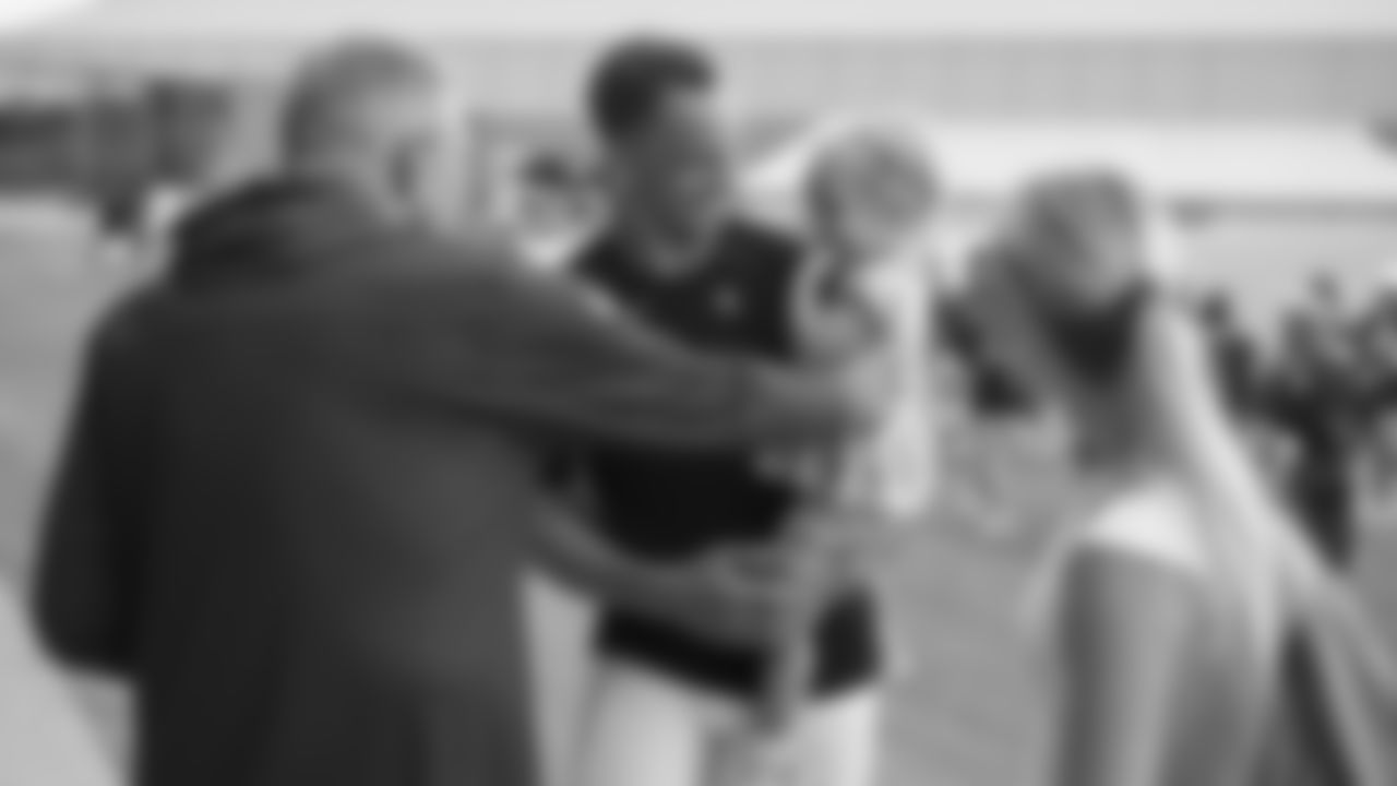 Atlanta Falcons owner Arthur Blank greets quarterback Desmond Ridder #9 and his family during AT&T Atlanta Falcons Training Camp at Atlanta Falcons Training Facility in Flowery Branch, Ga. on Wednesday, August 2, 2023. (Photo by Shanna Lockwood/Atlanta Falcons)