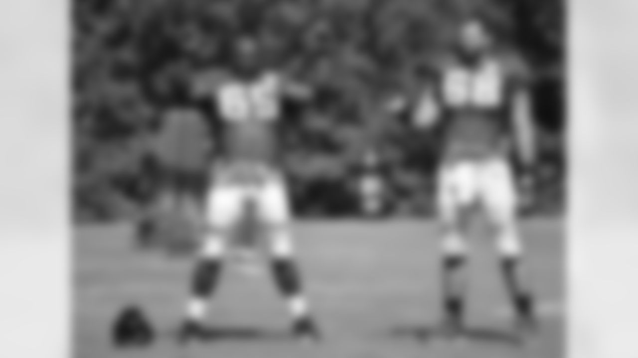 T Cameron Bradfield and OL Gabe Carimi