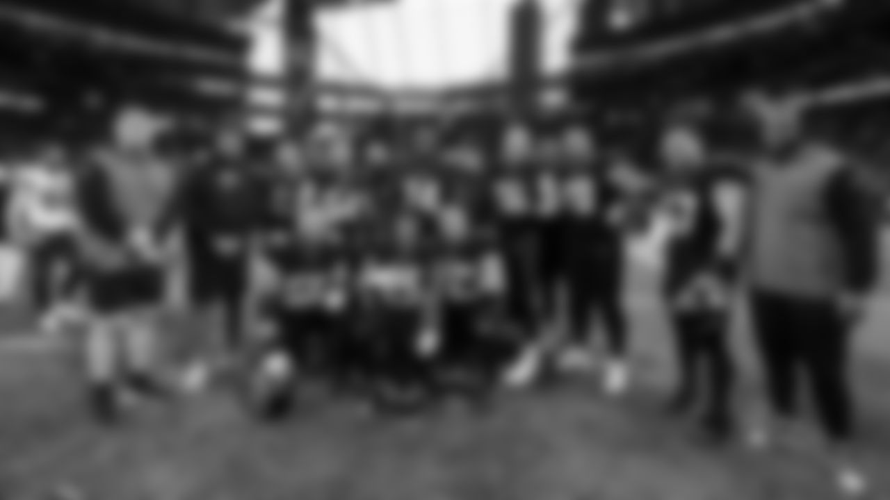 Atlanta Falcons players pose for a group photo after the game against the Tampa Bay Buccaneers at Mercedes-Benz Stadium in Atlanta, Georgia on Sunday, January 8, 2023. (Photo by Shanna Lockwood/Atlanta Falcons)