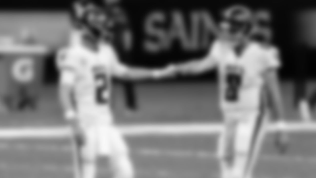Atlanta Falcons quarterback Matt Ryan #2 and quarterback Matt Schaub #8 bump fists during warms up before the game against the New Orleans Saints on November 22, 2020.