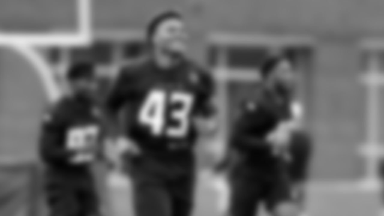 Atlanta Falcons linebacker Mykal Walker #43 runs during field work drills in Phase II of the Atlanta Falcons offseason program on May 18, 2021.