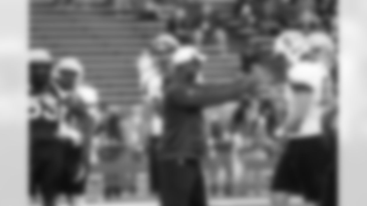 Special teams coordinator Keith Armstrong instructs players.