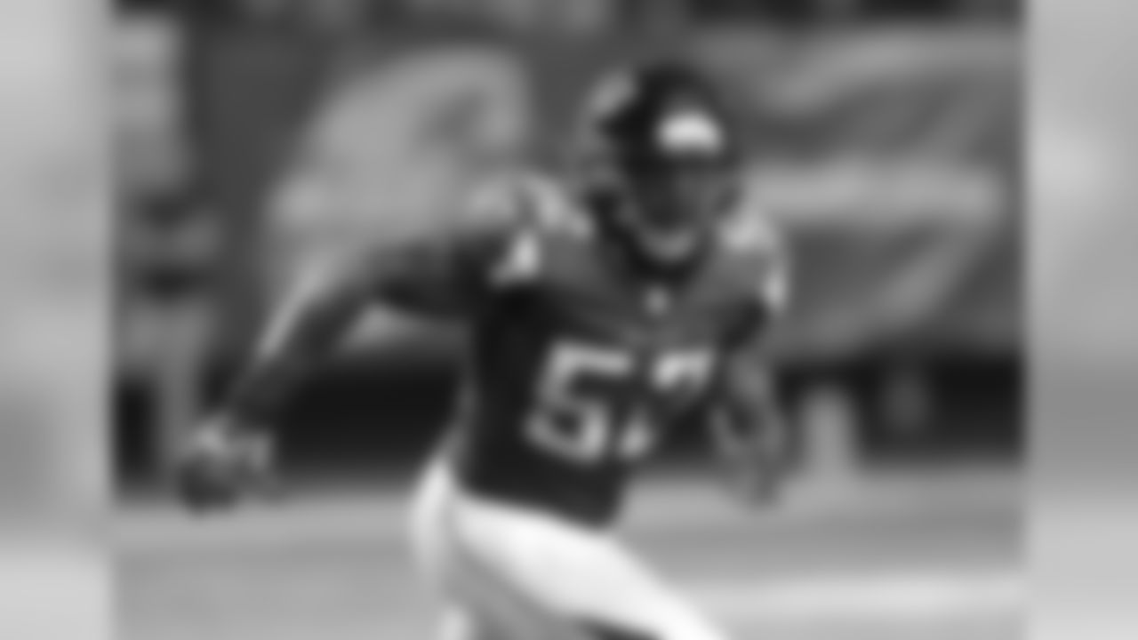 LB Tim Dobbins covers a play during the first half of the preseason game.