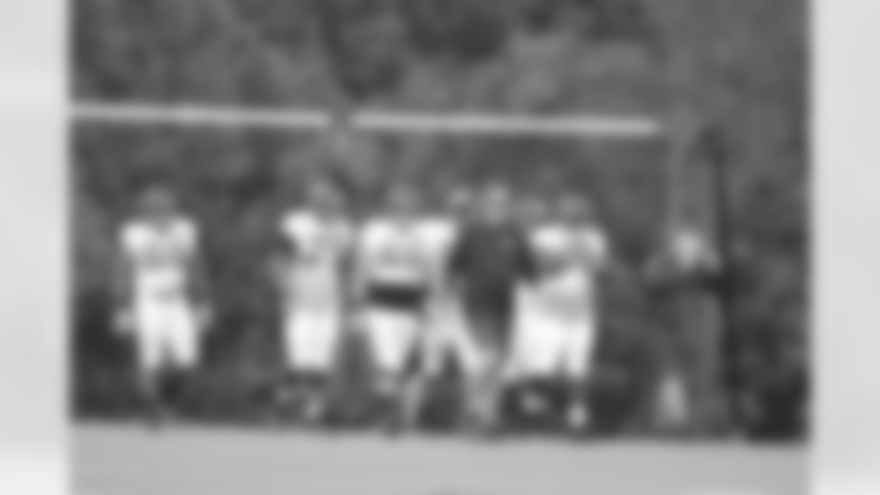 The offensive line follows the lead of offensive line coach, Mike Tice