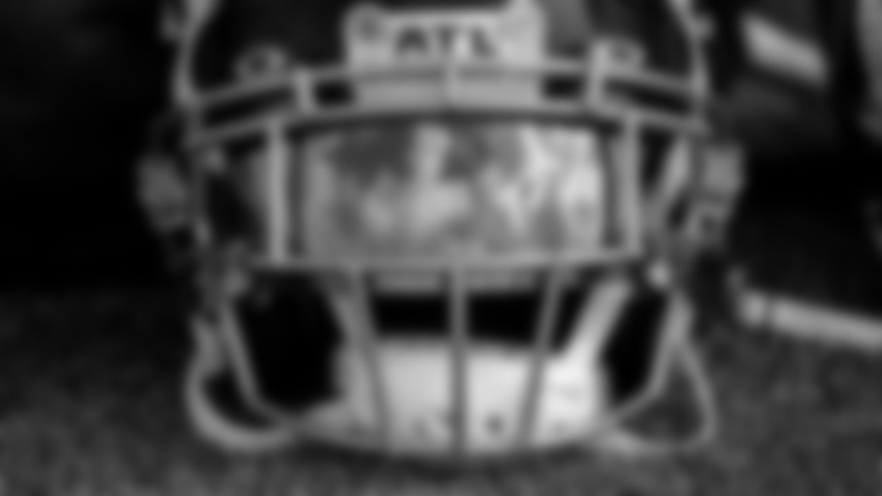 Clouds reflect in a helmet during joint practice with the Miami Dolphins on Wednesday August 18, 2021. (Photo by )