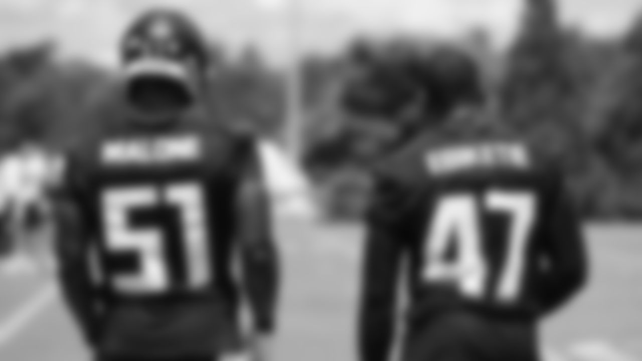 Atlanta Falcons offensive linebacker DeAngelo Malone #51 and offensive linebacker Arnold Ebiketie #47 during rookie minicamp practice in Flowery Branch, Georgia, on Saturday, May 14, 2022. (Photo by Shanna Lockwood/Atlanta Falcons)