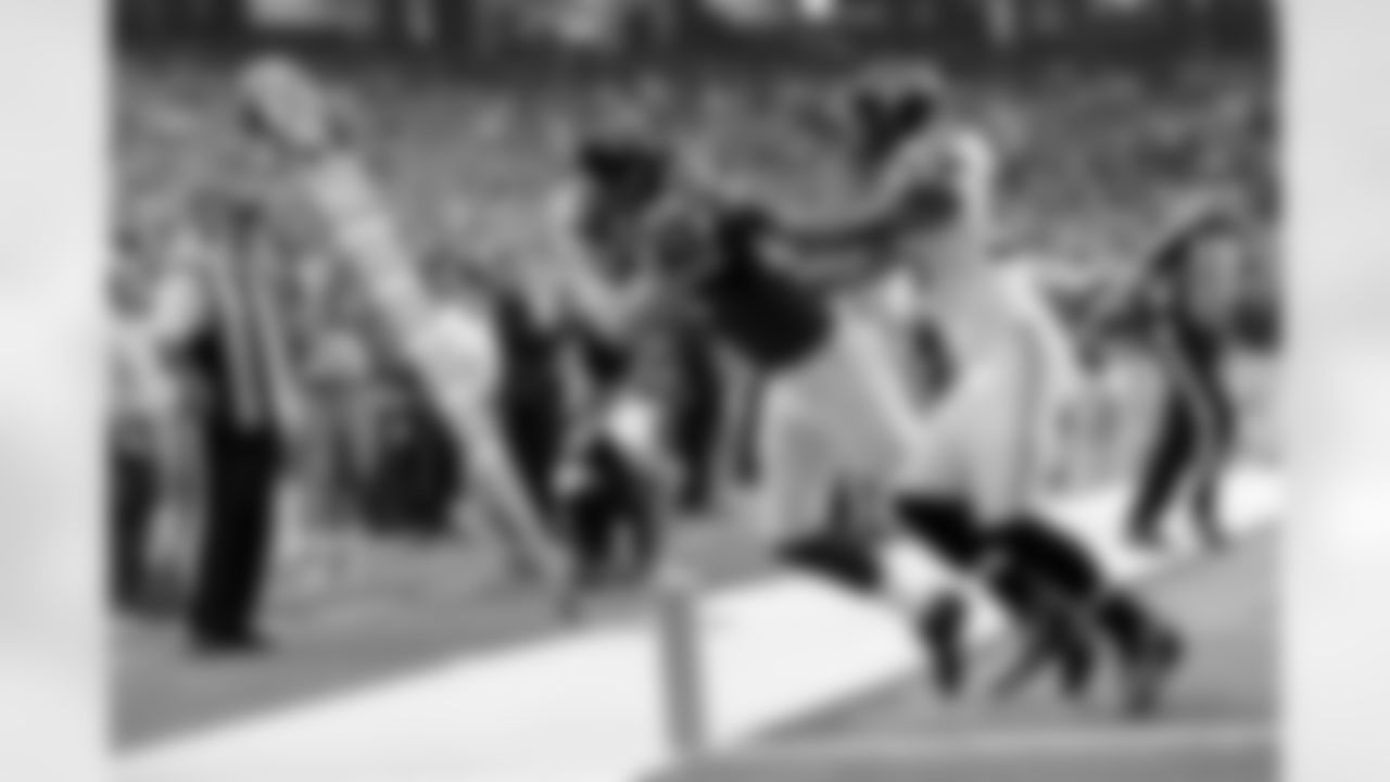 TE Chase Coffman stays in bounds for the catch