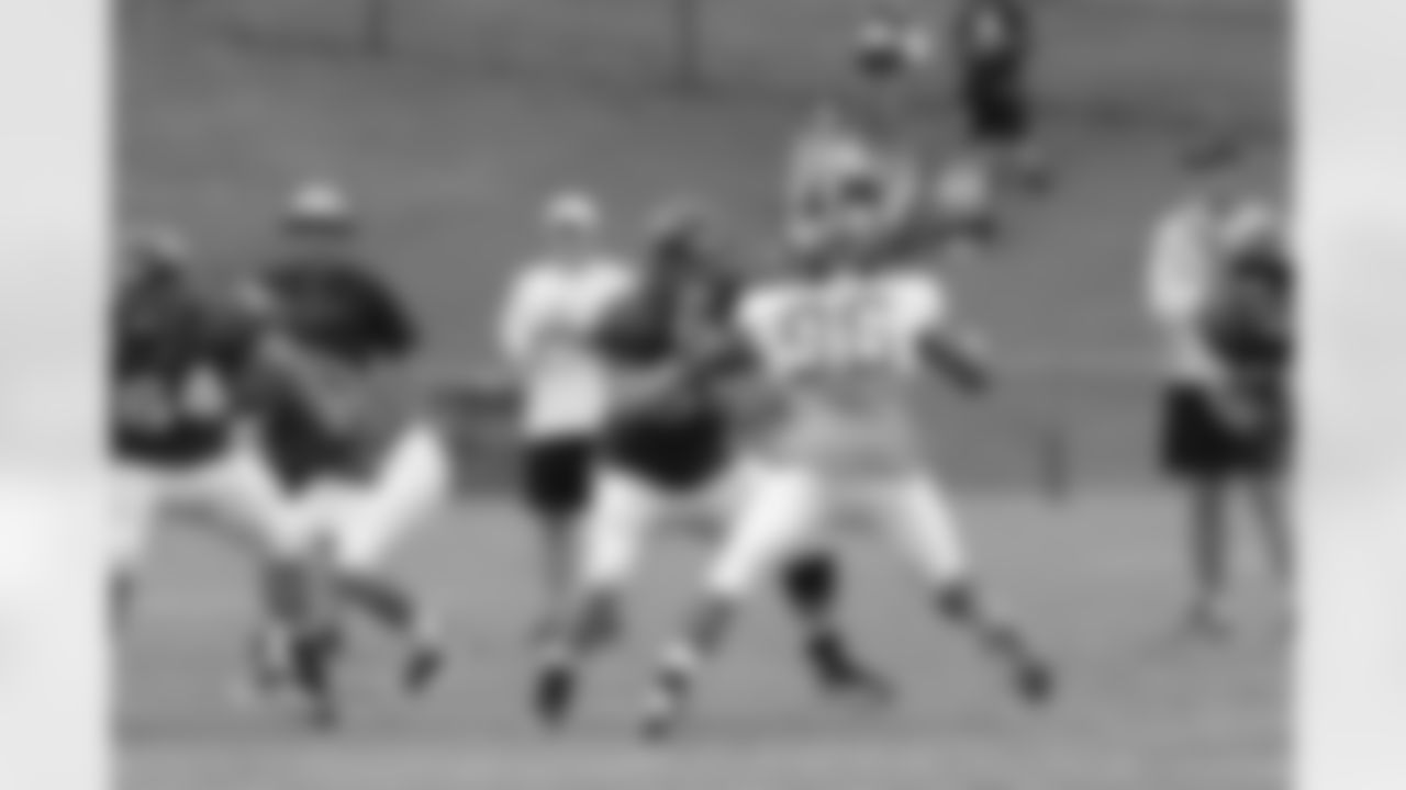 DE Emmanuel Stephens works against OL Andrew Jackson // 2011 Russell Athletic Training Camp - Day 8 // August 8, 2011 // Flowery Branch, Ga. —