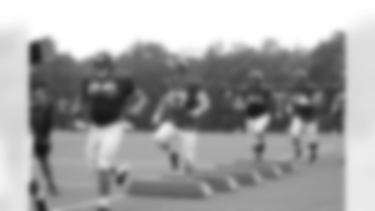 The offensive line works the bags // 2011 Russell Athletic Training Camp - Day 7 // August 7, 2011 // Flowery Branch, Ga. -