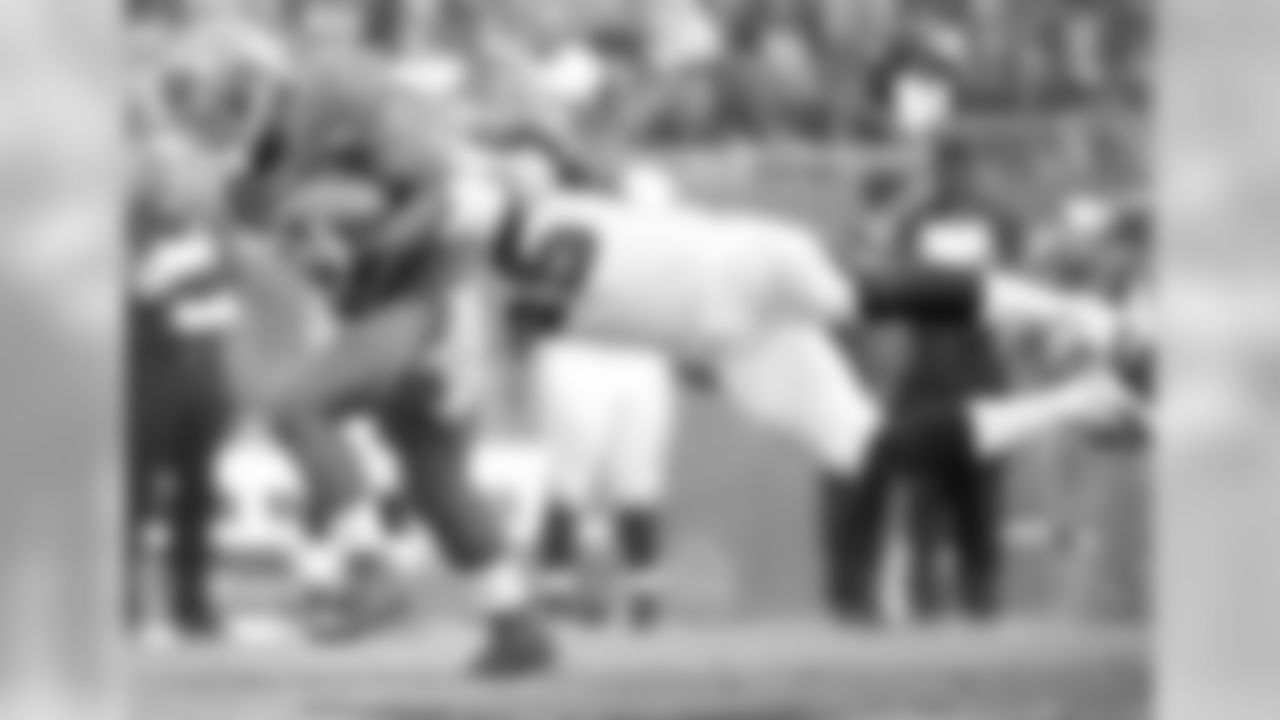 LB Paul Worrilow makes a flying grab onto Buccaneers RB Bobby Rainey