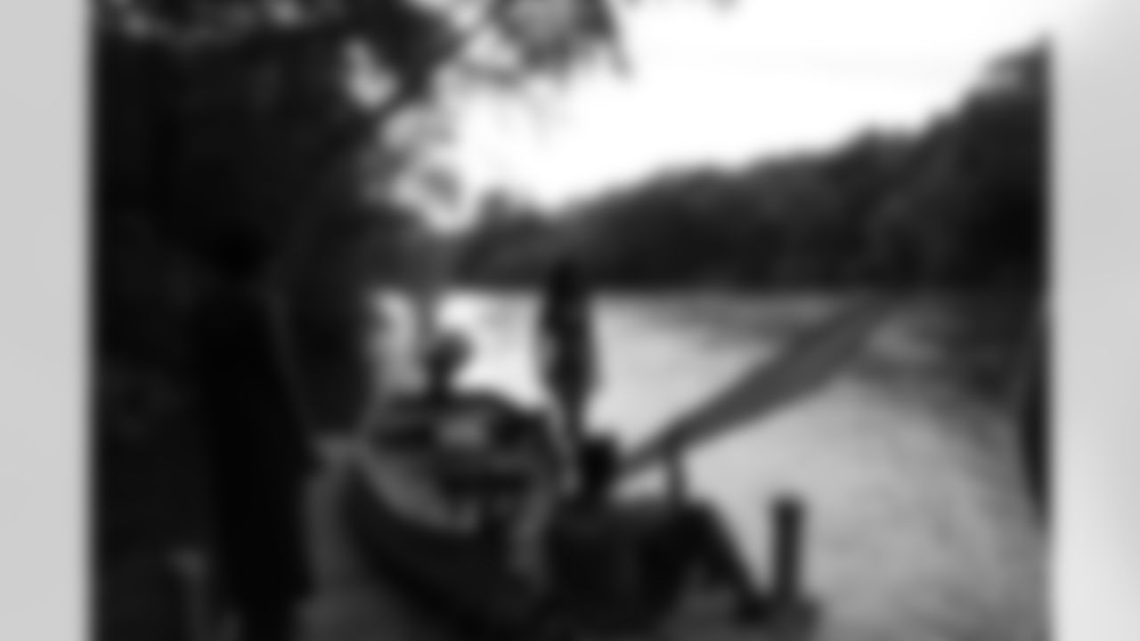 Micki J. takes her photos on a dock