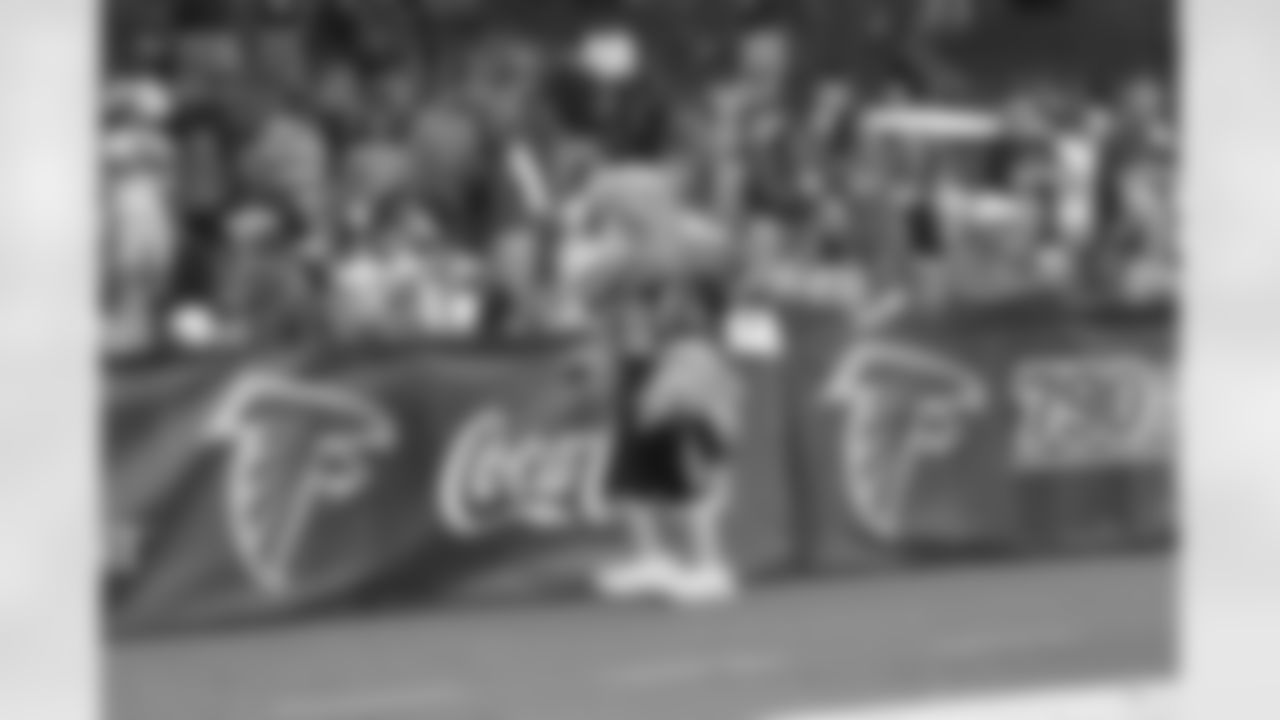 Freddie Falcon interacts with fans
