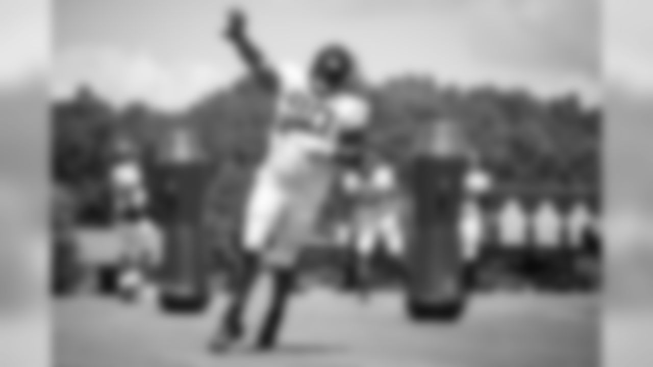 Atlanta Falcons defensive tackle Ra'Shede Hageman #90 runs a drill during practice. (Photo by Kara Durrette/Atlanta Falcons).