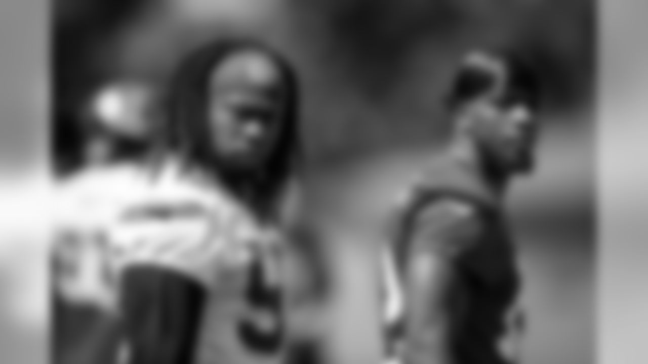 Atlanta Falcons defensive end Takk McKinley #98 and wide receiver Mohamed Sanu #12 look on during practice. (Photo by Kara Durrette/Atlanta Falcons).