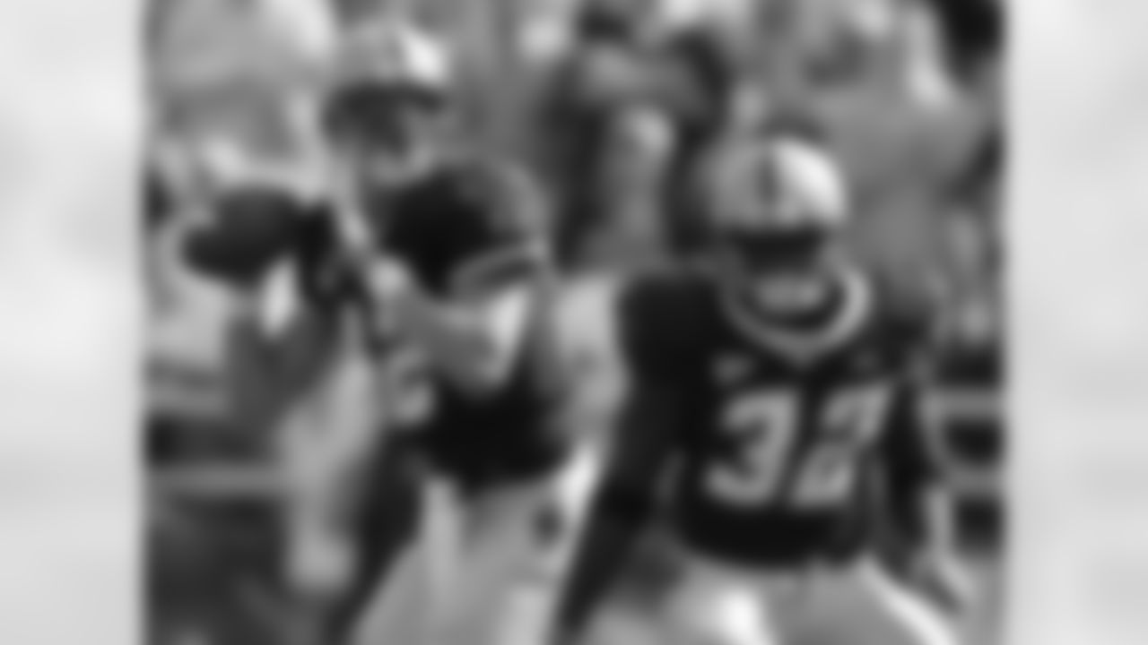 QB Matt Ryan looks to pass as RB Andre Callendar defends during a game against Brigham Young University on September 16, 2006