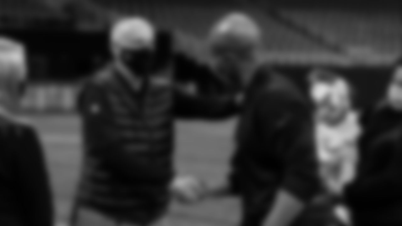 Atlanta Falcons president Rich McKay shakes hands with general manager Terry Fontenot during his first visit to Mercedes-Benz Stadium in Atlanta, Georgia, on Thursday January 21, 2021.