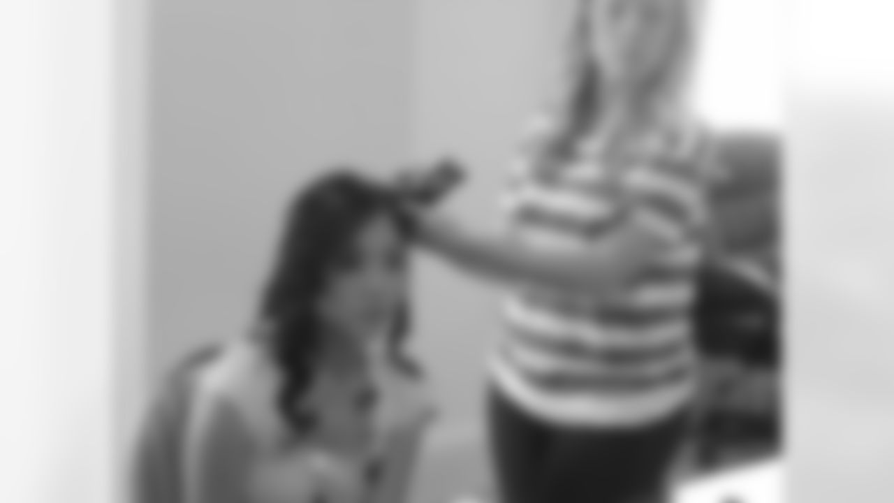 Cindy L. gets her hair done before her shoot Thursday // Atlanta Falcons Cheerleaders Swimsuit Calendar Photo Shoot - Day 1 // 5/26/11 // Bermuda -