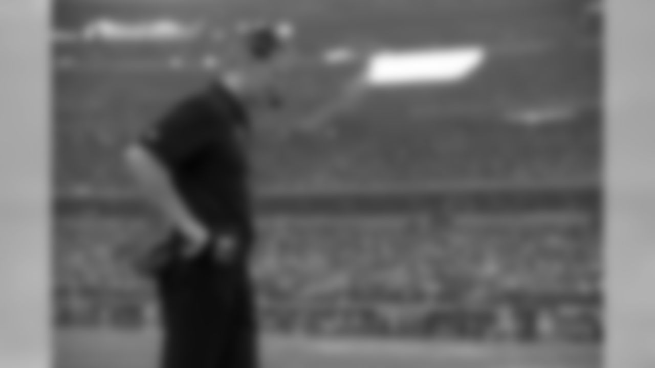 Dallas Cowboys head coach Jason Garrett walks along the sideline late in the first half of an NFL football game against the Washington Redskins, Sunday, Oct. 13, 2013, in Arlington, Texas. (AP Photo/Tim Sharp)