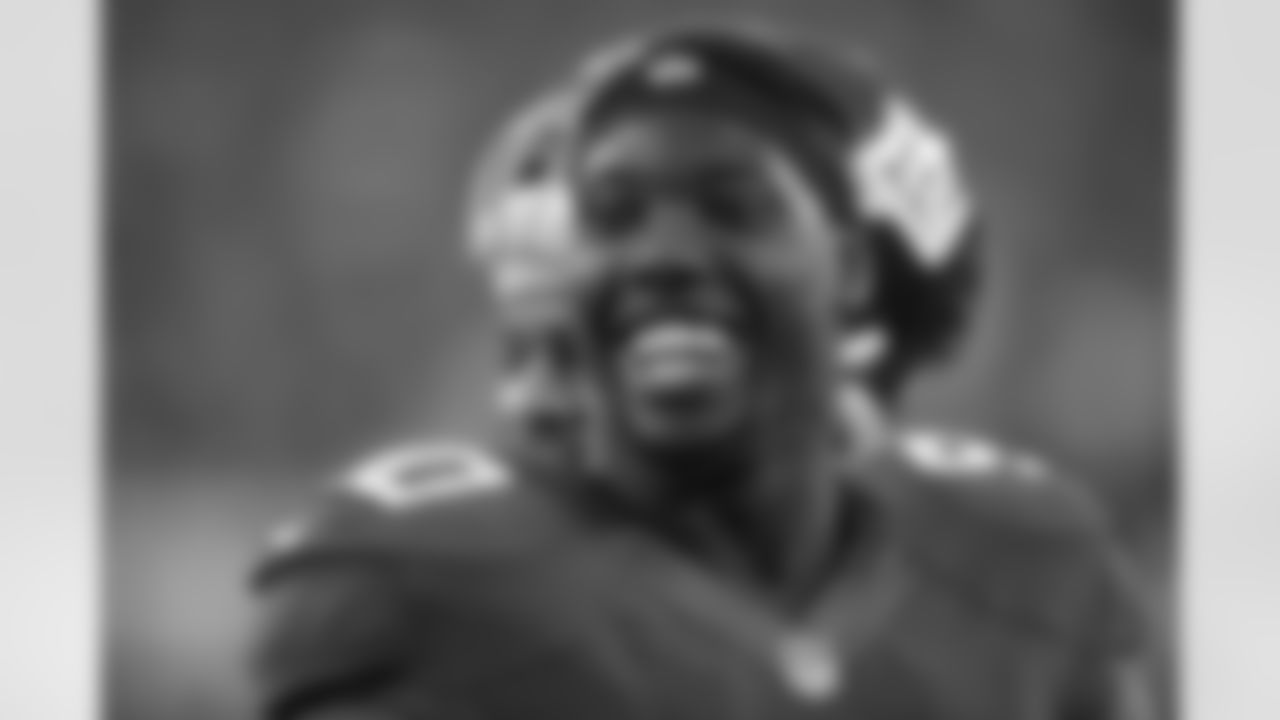 New York Giants' Jason Pierre-Paul warms up before an NFL football game against the Green Bay Packers Sunday, Nov. 17, 2013, in East Rutherford, N.J. (AP Photo/Seth Wenig)
