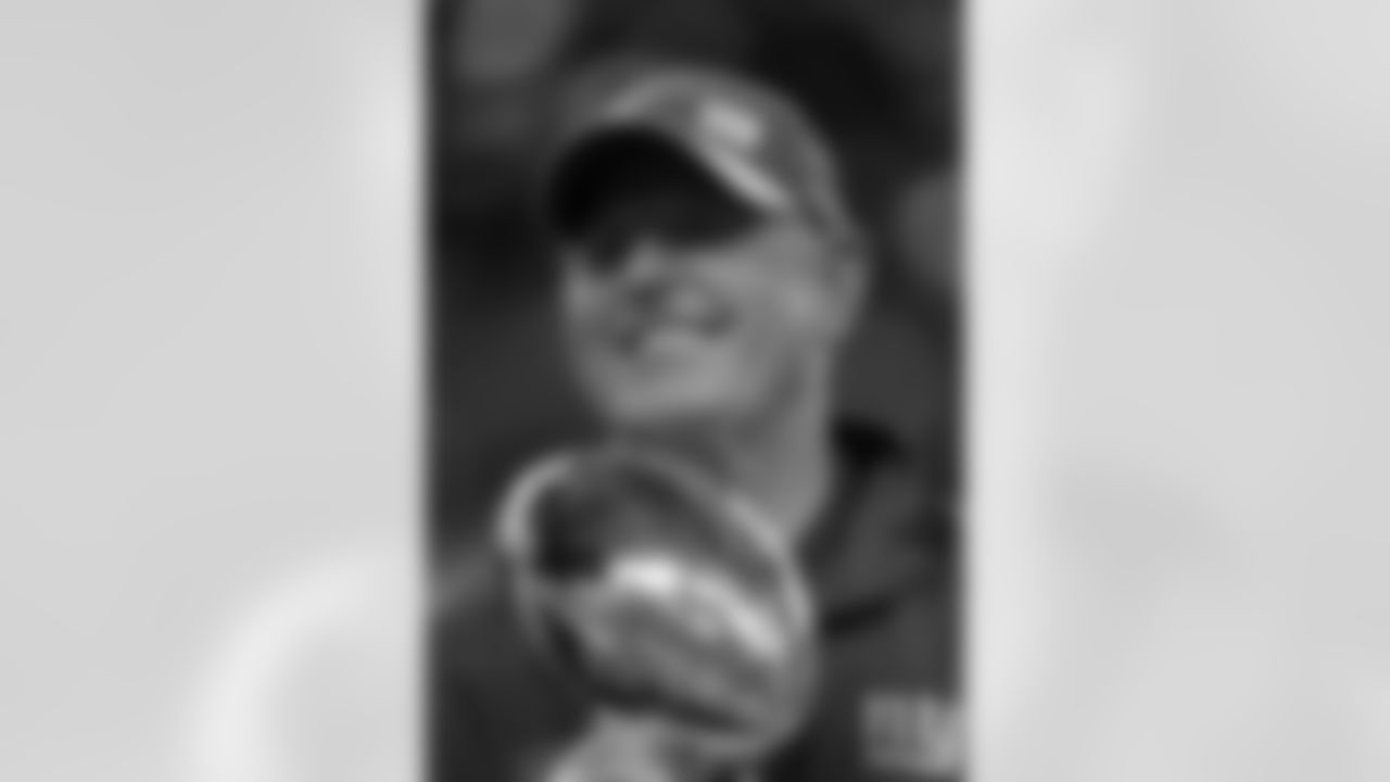 New York Giants head coach Tom Coughlin holds the Lombardi Trophy during the NFL Super Bowl XLVI football game against the New England Patriots on Sunday, February 5, 2012 in Indianapolis, IN. The Giants won the game 21-17. (AP Photo/Greg Trott)