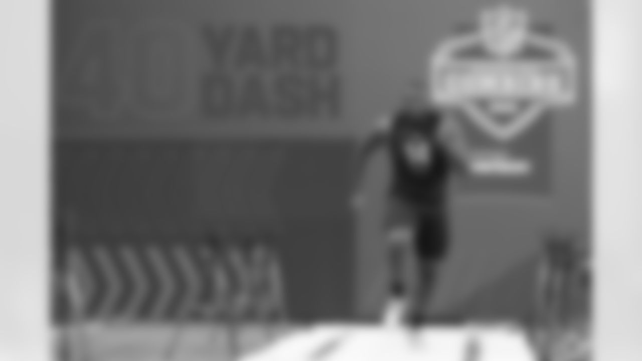 North Carolina offensive lineman Joshua Ezeudu runs the 40-yard dash during the NFL football scouting combine, Friday, March 4, 2022, in Indianapolis. (AP Photo/Darron Cummings)