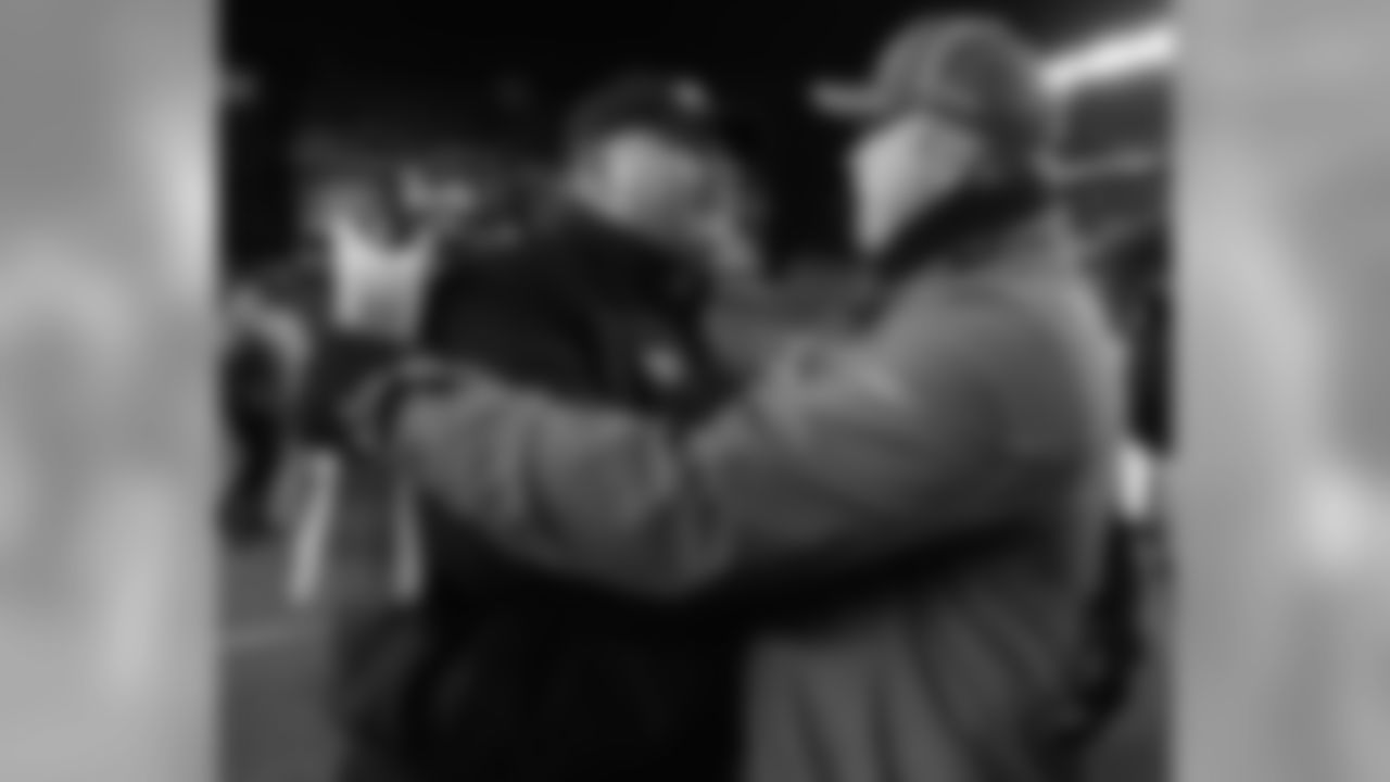 Philadelphia Eagles coach Andy Reid greets Green Bay Packers coach Mike McCarthy, right, after the Packers' 21-16 win in an NFL football NFC wild-card playoff game in Philadelphia, Sunday, Jan. 9, 2011. (AP Photo/Matt Slocum)