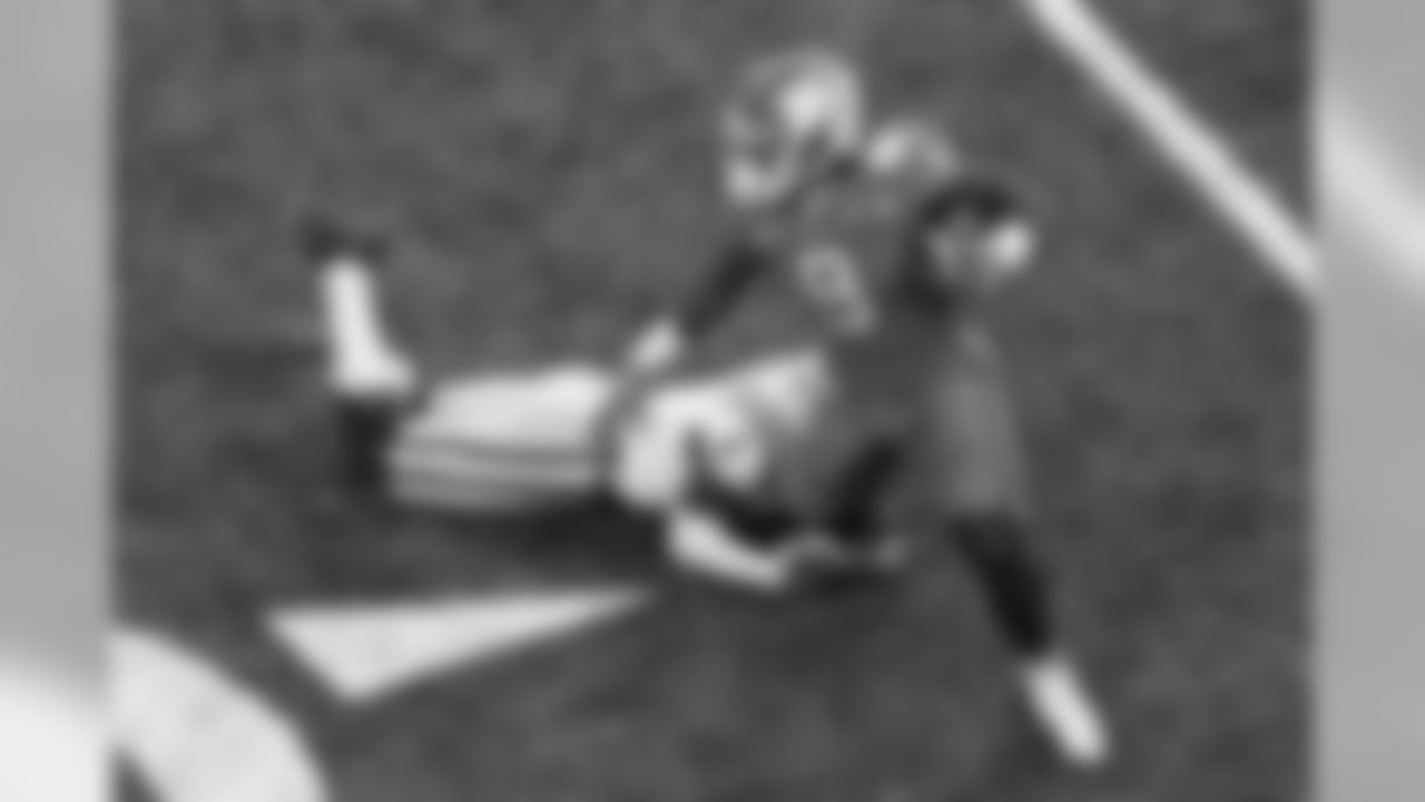 Clemson running back Travis Etienne is tackled by LSU cornerback Kristian Fulton during the first half of a NCAA College Football Playoff national championship game Monday, Jan. 13, 2020, in New Orleans. (AP Photo/Eric Gay)