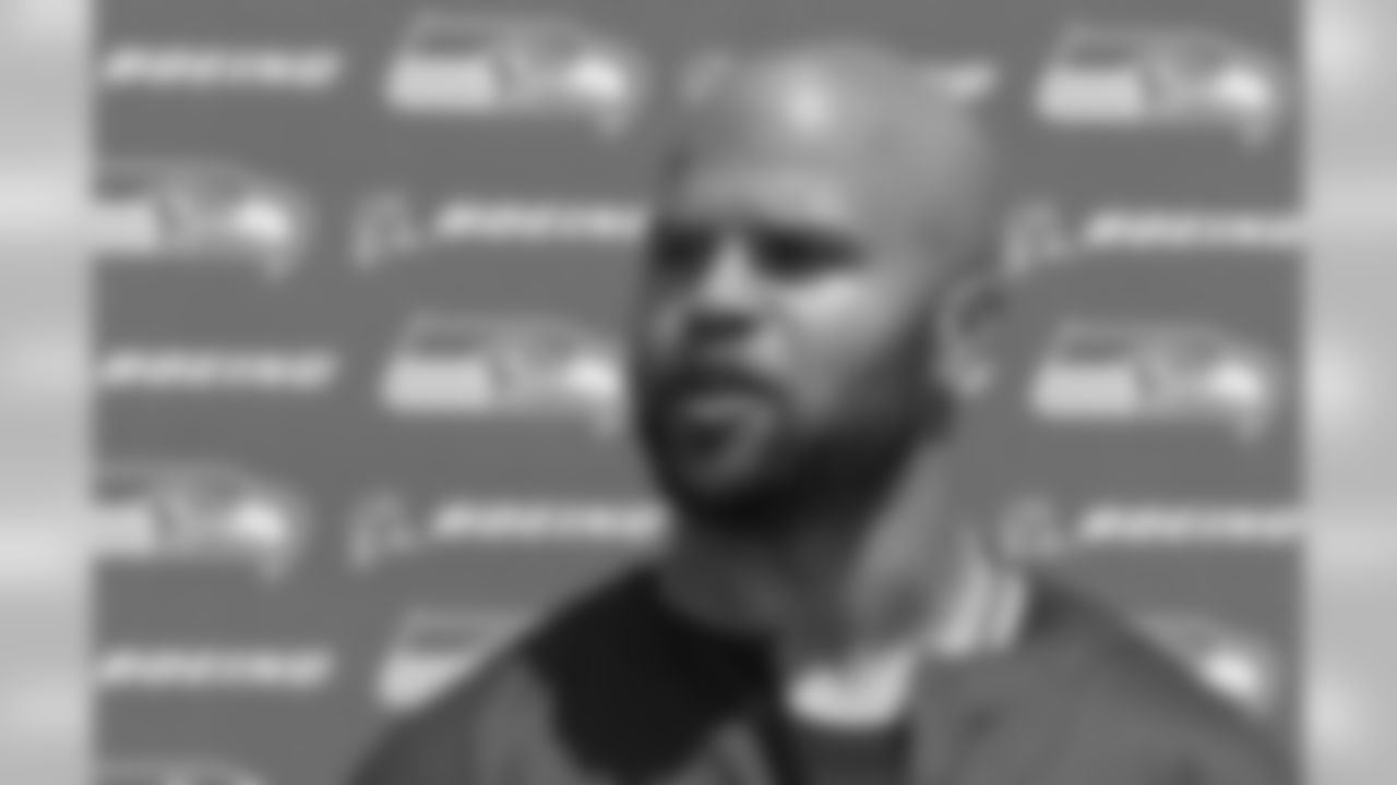 Seattle Seahawks defensive coordinator Kris Richard talks to reporters following an organized team activity Tuesday, May 26, 2015, in Renton, Wash. (AP Photo/Ted S. Warren)