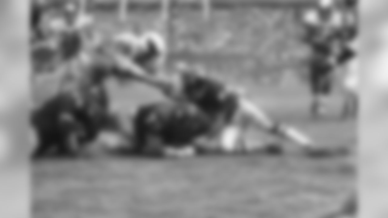 Jim Kanicki (73) defensive tackle of the New York Giants covers fumble made by Tom Woodeshick (not shown) right back of the Philadelphia Eagles during the fourth quarter at Yankee Stadium, Sunday, Oct. 12, 1970, New York. Others shown in the play are Jerry Shay (75) of the Giants, Mike Evans (50) of the Eagles, and Tom Longo (44) of the Giants. The Giants won, 30-23. (AP Photo/J. Spencer Jones)