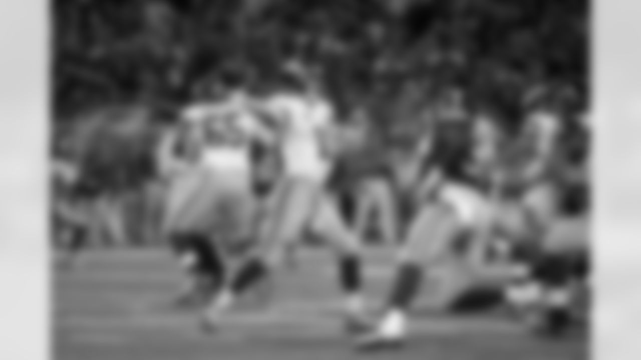New York Giants quarterback Eli Manning throws a pass against the St. Louis Rams during a NFL football game on Sunday, Dec. 21, 2014 in St. Louis. The Giants won the game, 37-27. (AP Photo/G. Newman Lowrance)