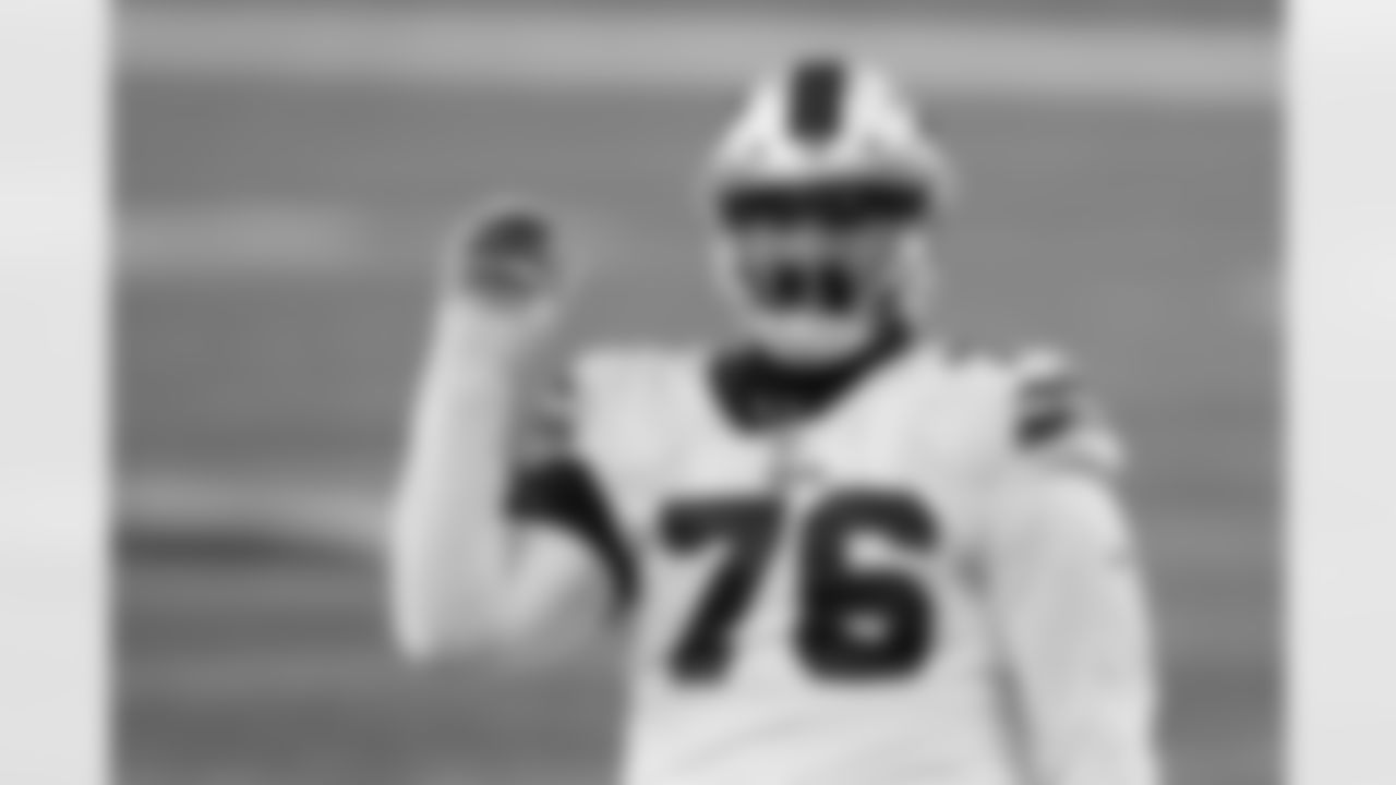 Buffalo Bills guard Jon Feliciano (76) waves during an NFL game against the New England Patriots, Monday, Dec. 28, 2020, in Foxborough, Mass. The Bills beat the Patriots 38-9. (Cooper Neill via AP)