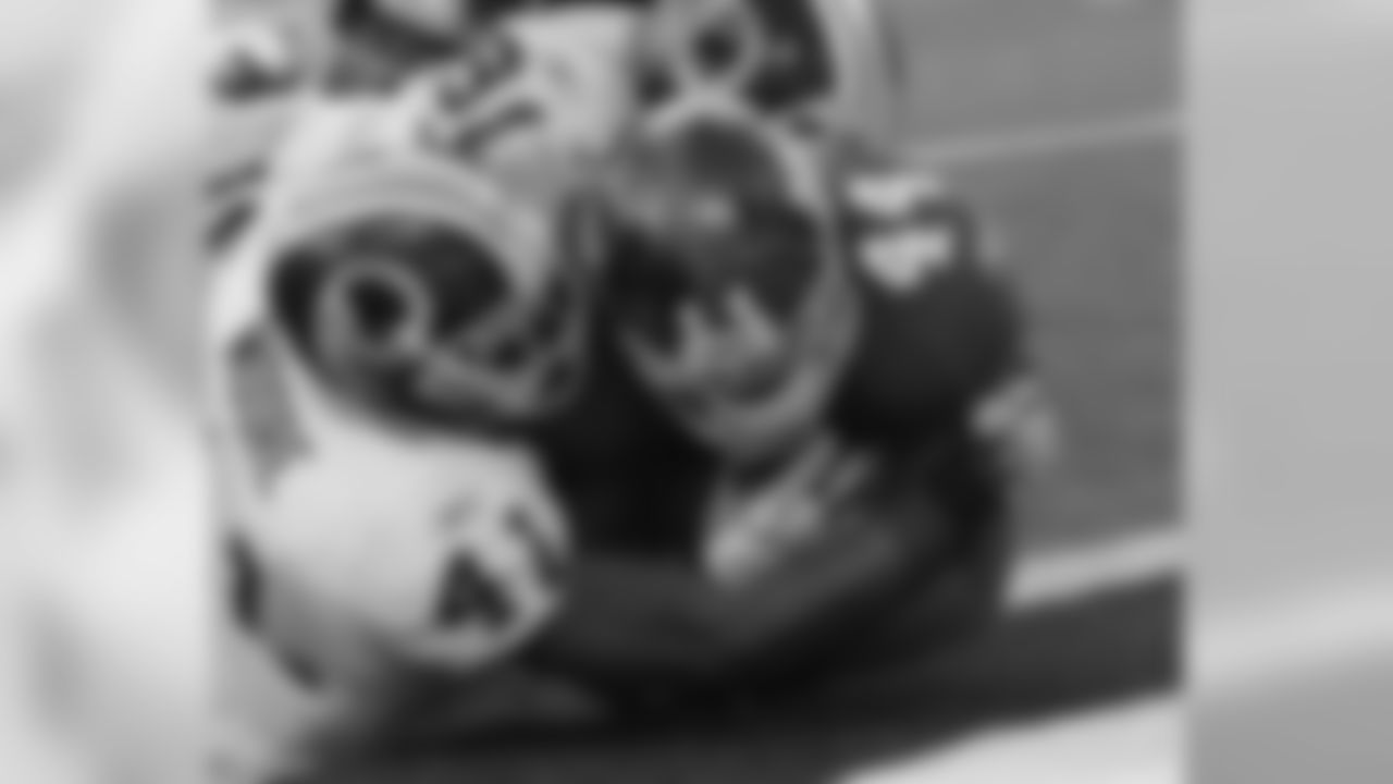 RB Ahmad Bradshaw power through the Redskins defense for one of his two touchdowns.