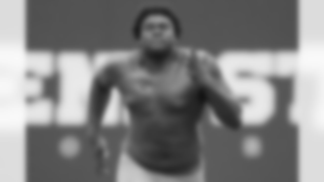 Offensive lineman Rasheed Walker runs the 40-yard dash in football drills during Penn State's Pro Day, Thursday, March 24, 2022, in State College, Pa. (AP Photo/Gene J. Puskar)