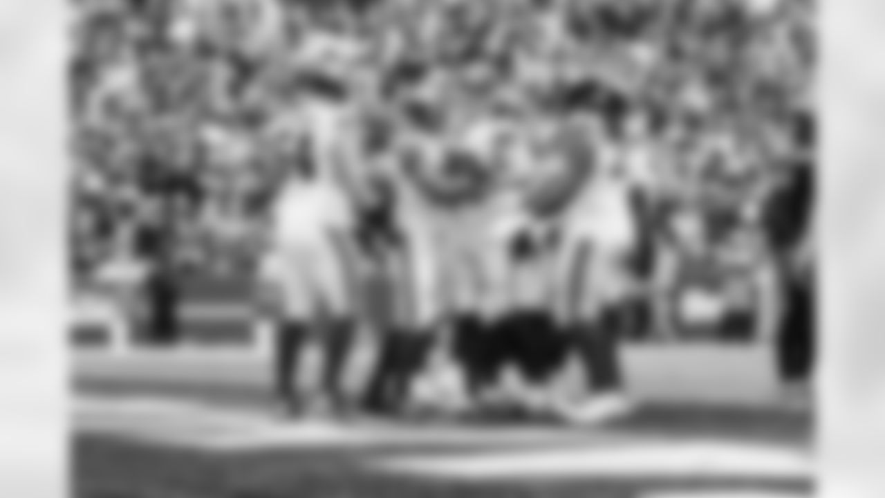 Mark Glowinski (64), Saquon Barkley (26), Tanner Hudson (88)