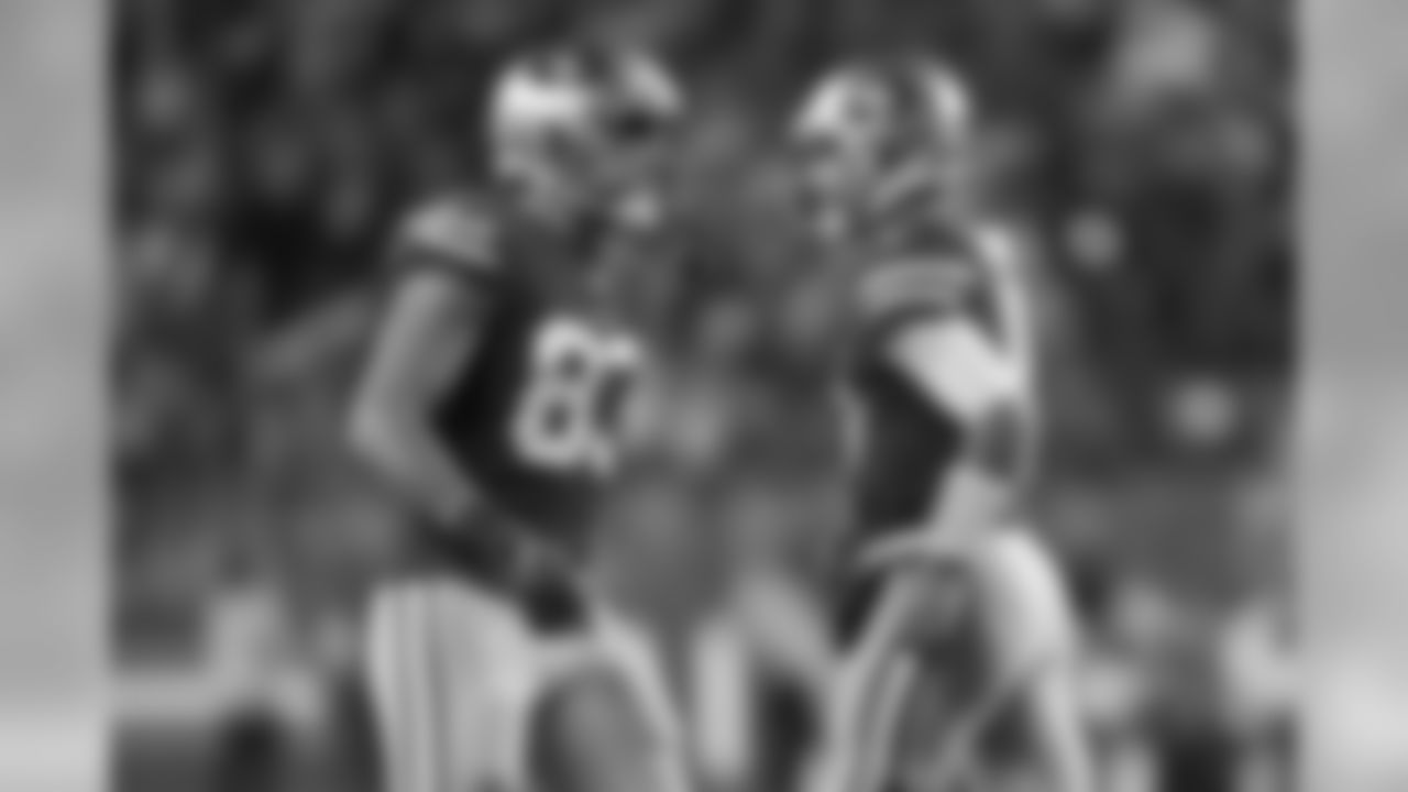 San Francisco 49ers tight end Levine Toilolo (83) and quarterback Jimmy Garoppolo (10) celebrate during the NFL NFC Championship football game against the Green Bay Packers, Sunday, Jan. 19, 2020, in Santa Clara, Calif. The 49ers beat the Packers 37-20. (Cooper Neill via AP)