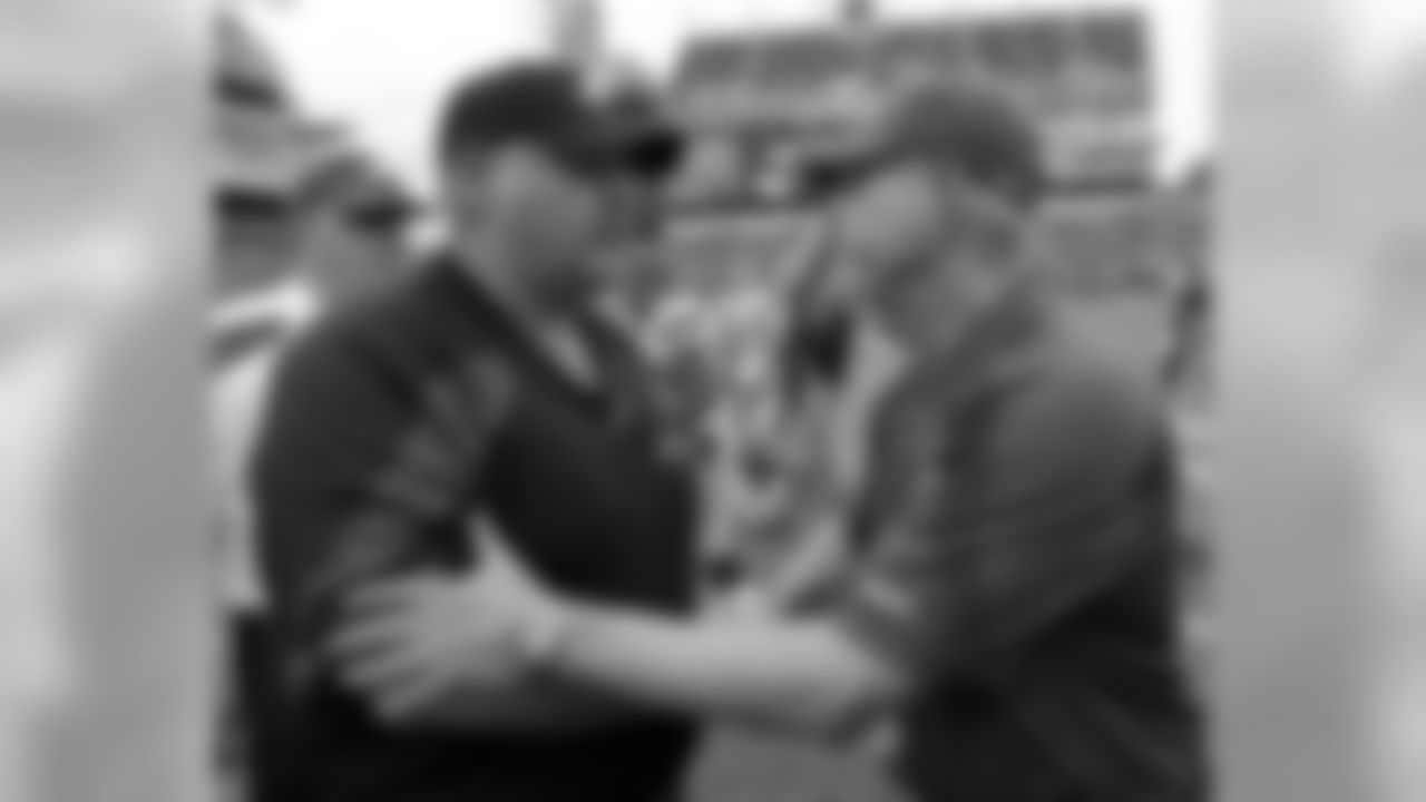 Philadelphia Eagles coach Andy Reid, left, and New York Giants coach Tom Coughlin shake hands at midfield after an NFL football game on Sunday, Sept. 25, 2011, in Philadelphia. Giants won 29-16. (AP Photo/Alex Brandon)