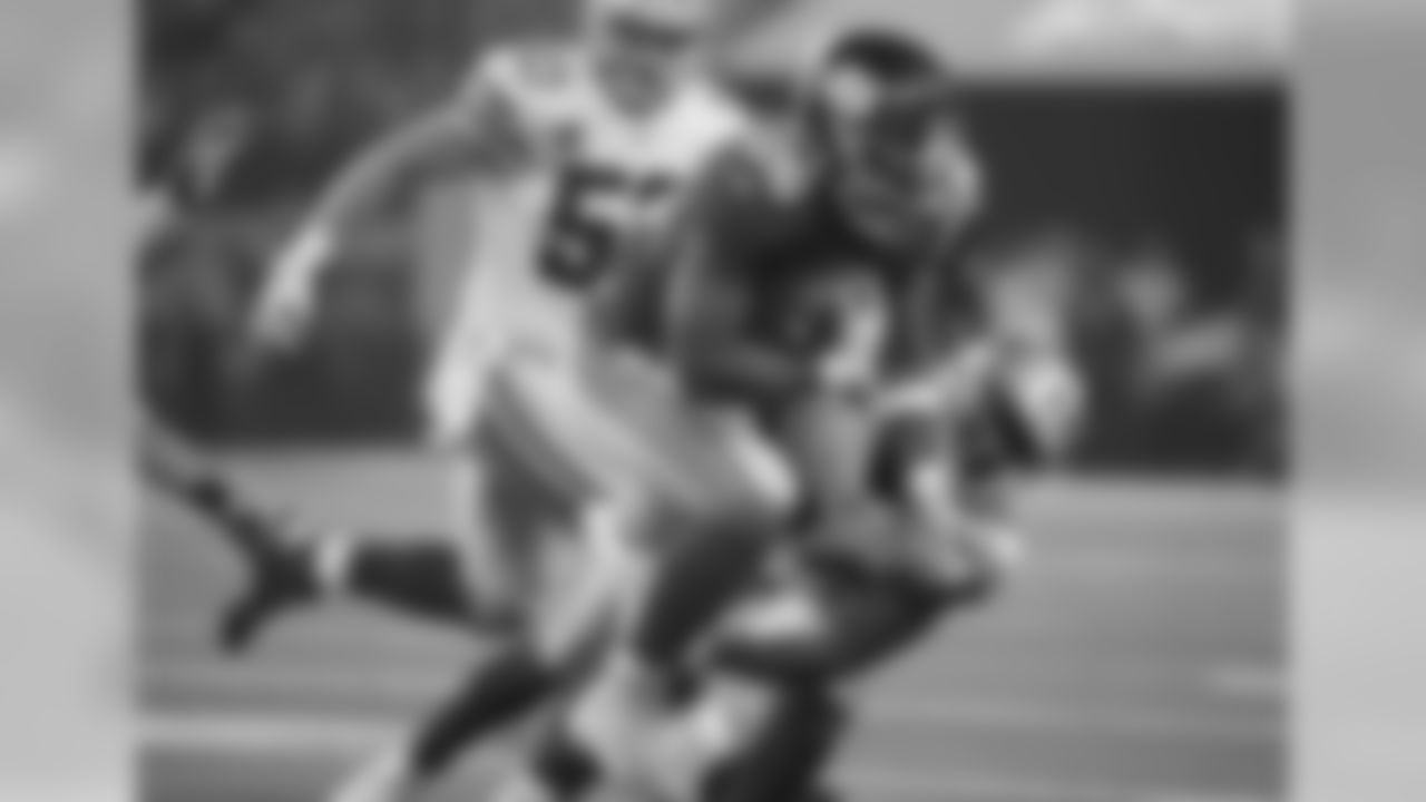 New York Giants running back Saquon Barkley (26) runs past Dallas Cowboys cornerback Chidobe Awuzie (24) during the first half of an NFL football game in Arlington, Texas, Sunday, Sept. 16, 2018. (AP Photo/Ron Jenkins)