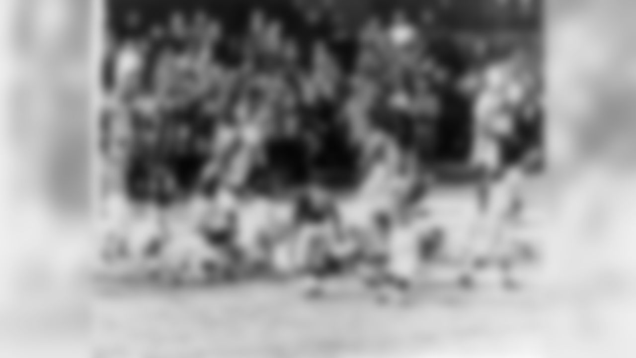 Baltimore Colts fullback Alan Ameche scores the winning touchdown in a 23 to 17 Baltimore Colts overtime win over the New York Giants in the 1958 NFL Championship game played at Yankee Stadium on Dec. 28, 1958 in Bronx, New York. (AP Photo/NFL Photos)