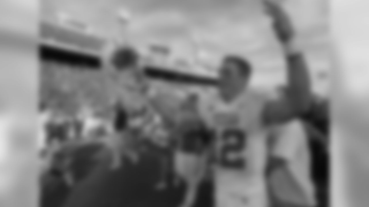 Texas quarterback Colt McCoy celebrates the team's 28-10 win over Oklahoma in their football game, Saturday, Oct. 7, 2006, in Dallas. (AP Photo/Matt Slocum)