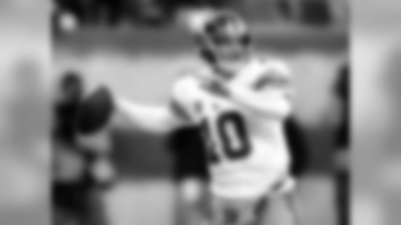 In this Dec. 24, 2011, photo, New York Giants quarterback Eli Manning looks to pass during the second quarter of an NFL football game against the New York Jets, in East Rutherford, N.J. With a running game that is last in the league, the Giants' offense must rely on the arm of Eli Manning in their playoff game scheduled for Jan. 8 against the Atlanta Falcons. (AP Photo/Bill Kostroun)