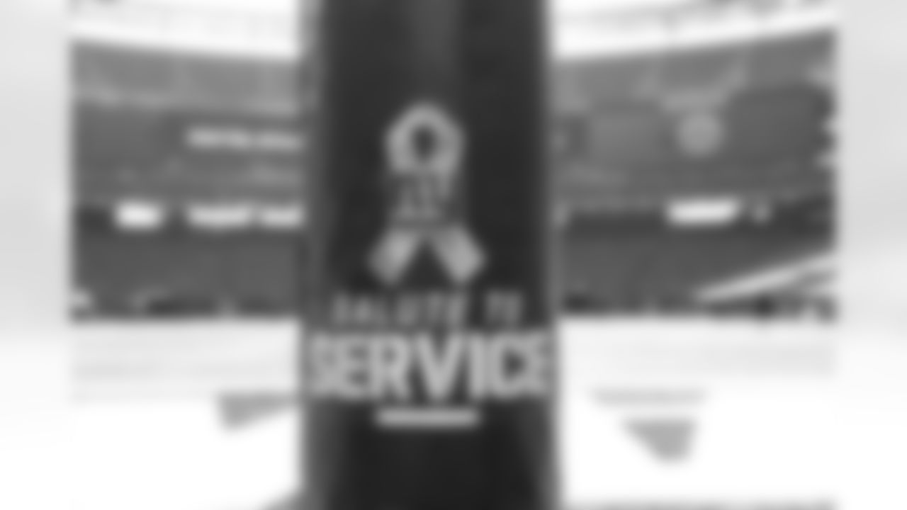 A close up, detail view of a Salute to Service goal post wrap before an NFL football game between the New York Giants and the Las Vegas Raiders, Sunday, Nov. 7, 2021, in East Rutherford. N.J. (AP Photo/Steve Luciano)