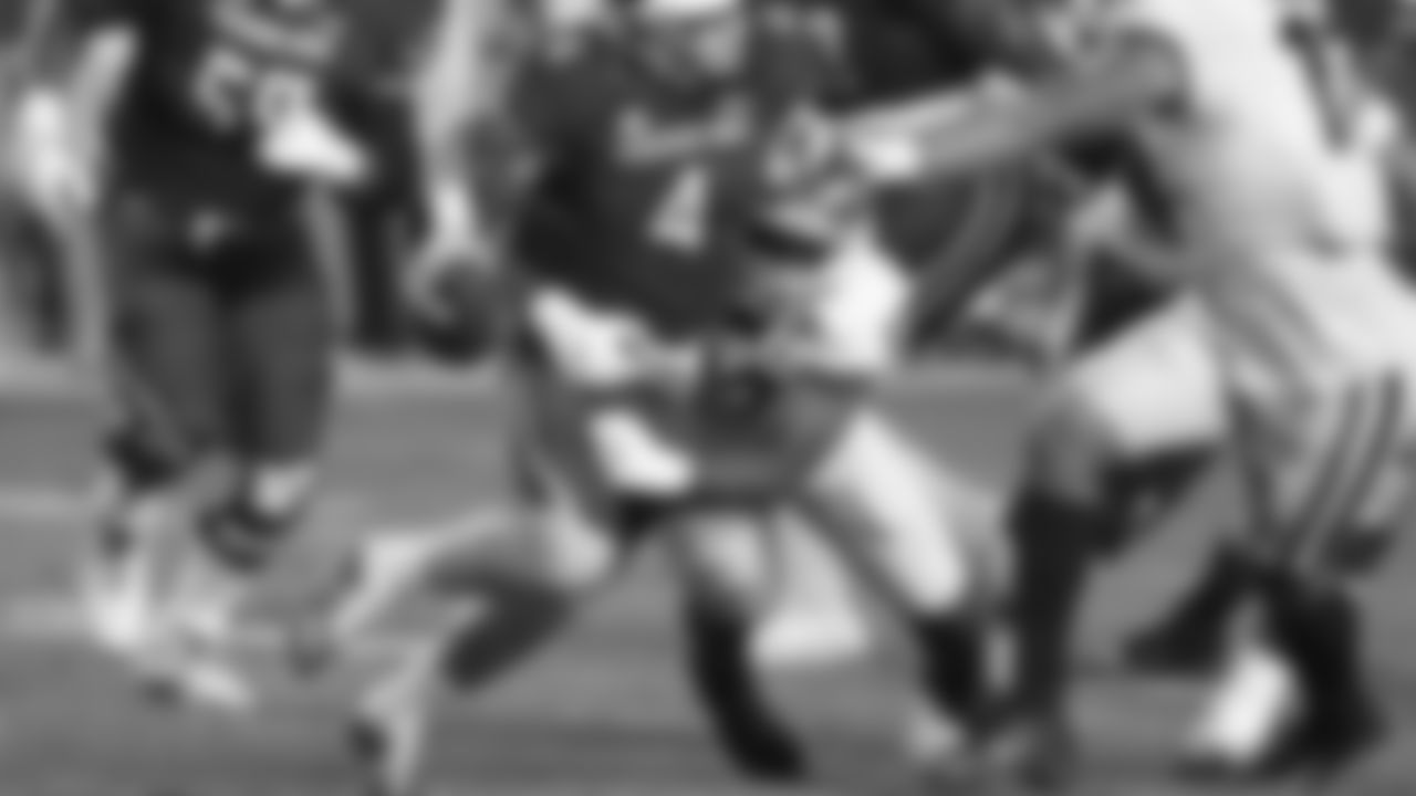 Georgia linebacker Azeez Ojulari (13) sacks South Carolina quarterback Luke Doty (4) during the first half of an NCAA college football game Saturday, Nov. 28, 2020, in Columbia, S.C. (AP Photo/Sean Rayford)