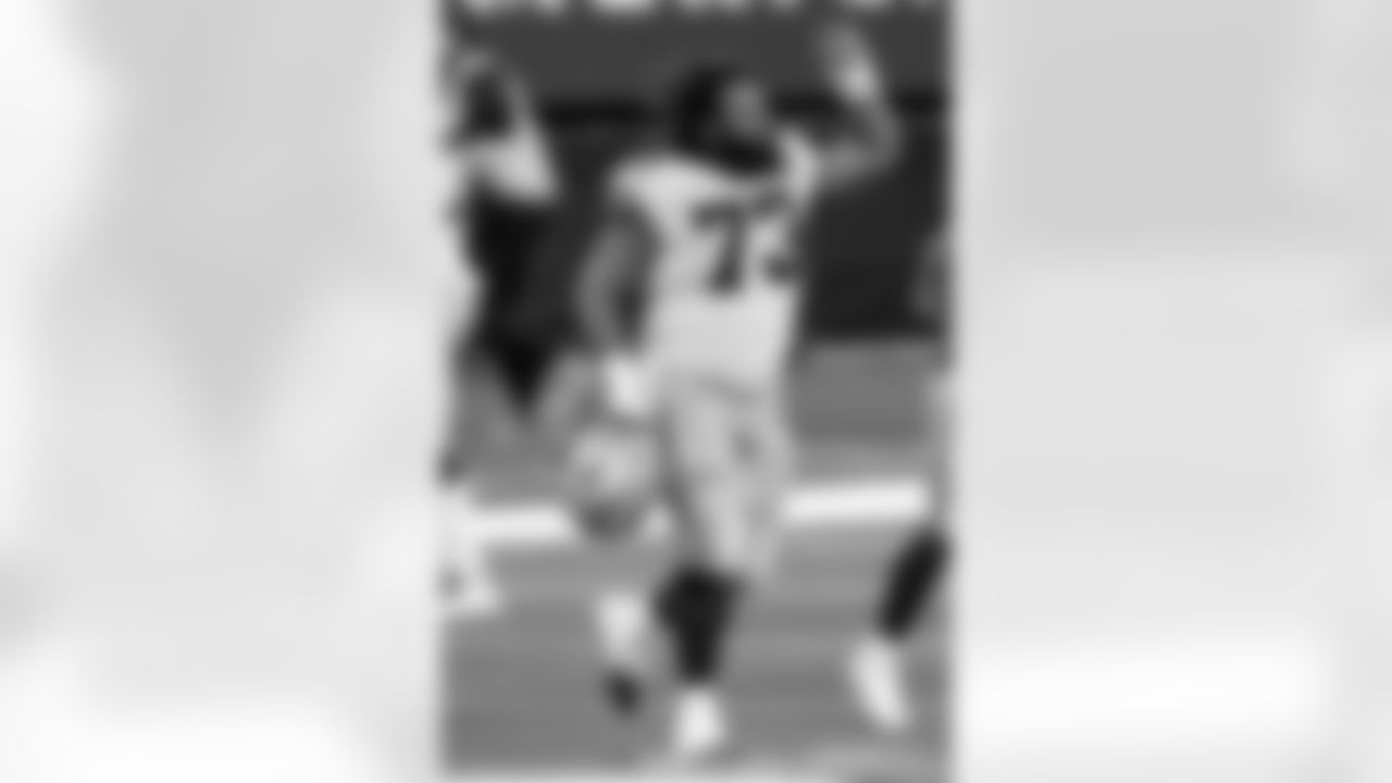 Dallas Cowboys center Joe Looney (73) celebrates a interception by cornerback Trevon Diggs during an NFL football game against the San Francisco 49ers, Sunday, Dec. 20, 2020, in Arlington, Texas. Dallas won 41-33. (AP Photo/Brandon Wade)