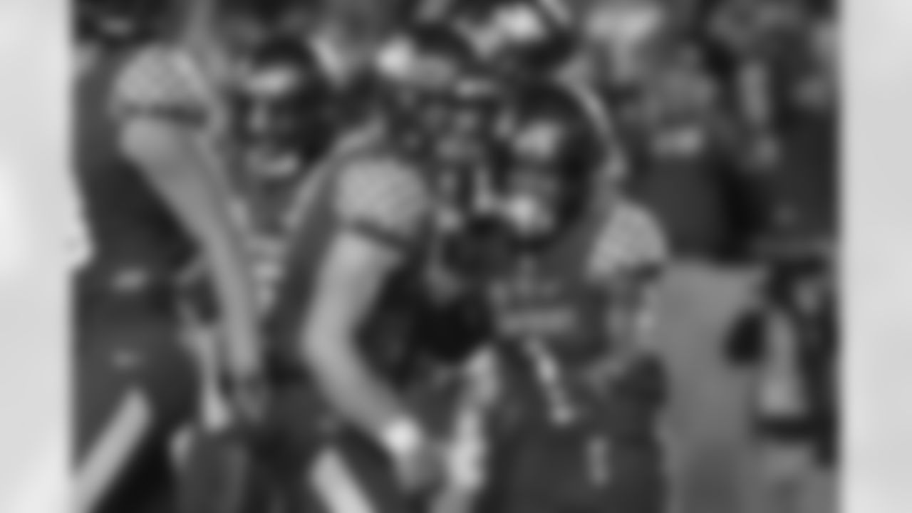 Kentucky quarterback Will Levis (7) and wide receiver Wan'Dale Robinson (1) celebrate a Robinson touchdown during an NCAA college football game against Tennessee in Lexington, Ky., Saturday, Nov. 6, 2021. (AP Photo/Michael Clubb)