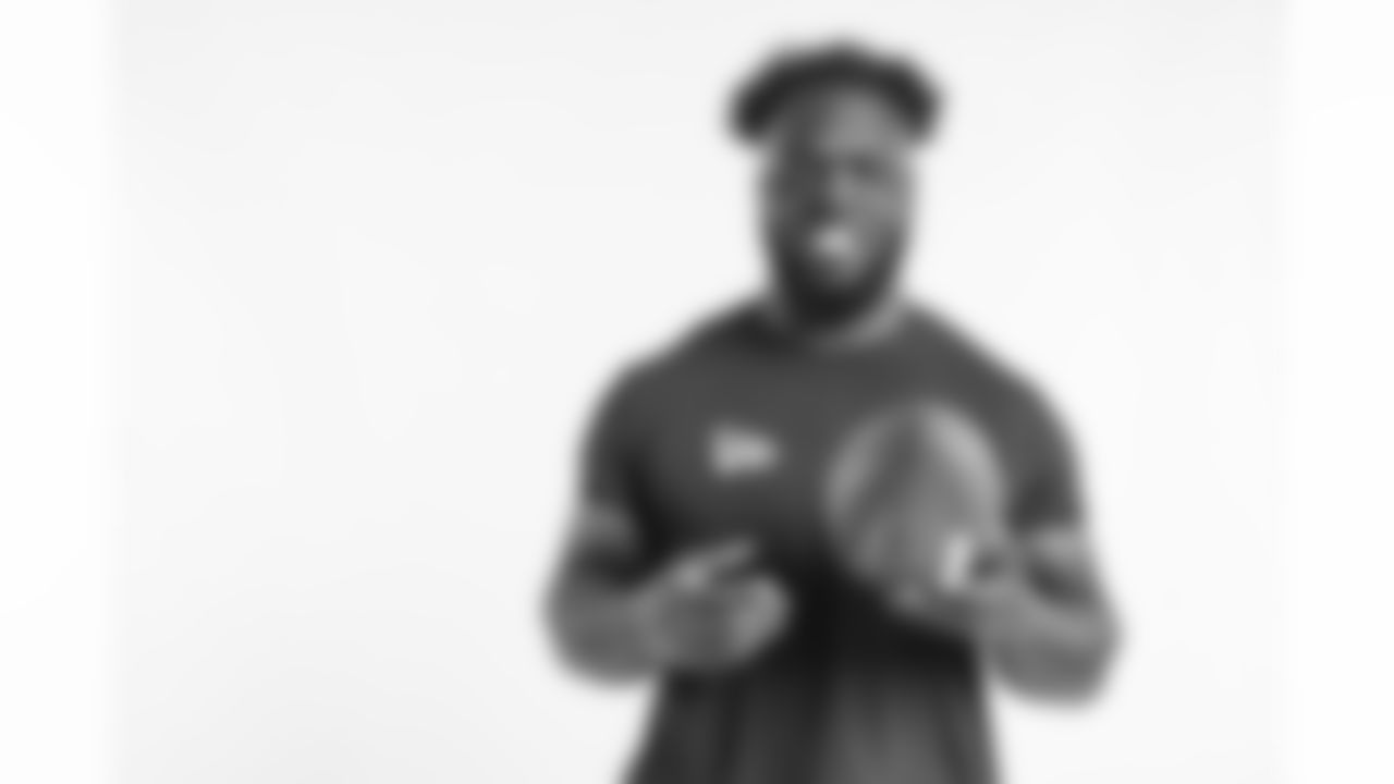 Michigan defensive end Kwity Paye poses for a portrait Saturday, March 6, 2021 in Phoenix. (Todd Rosenberg via AP)