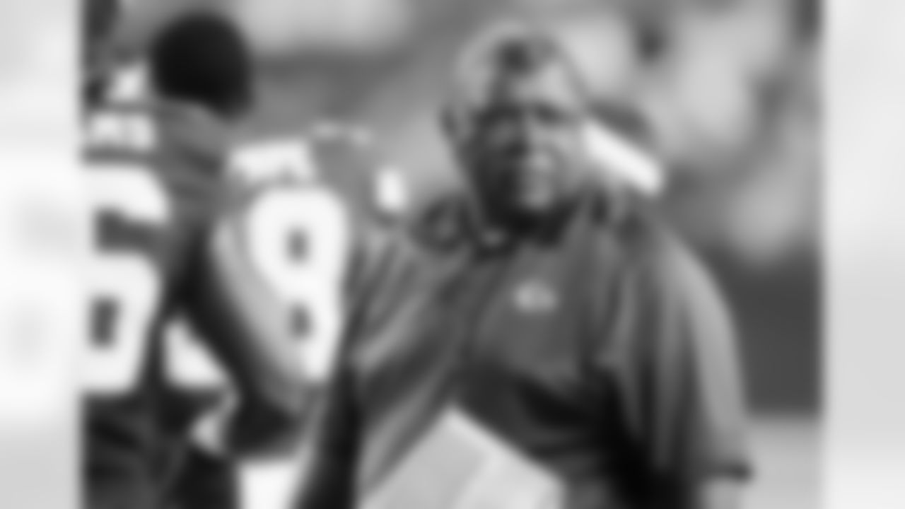 Kansas City Chiefs coach Romeo Crennel looks down the bench during the second half of an NFL preseason football game against the Arizona Cardinals in Kansas City, Mo., Friday, Aug. 10, 2012. (AP Photo/Colin E. Braley)