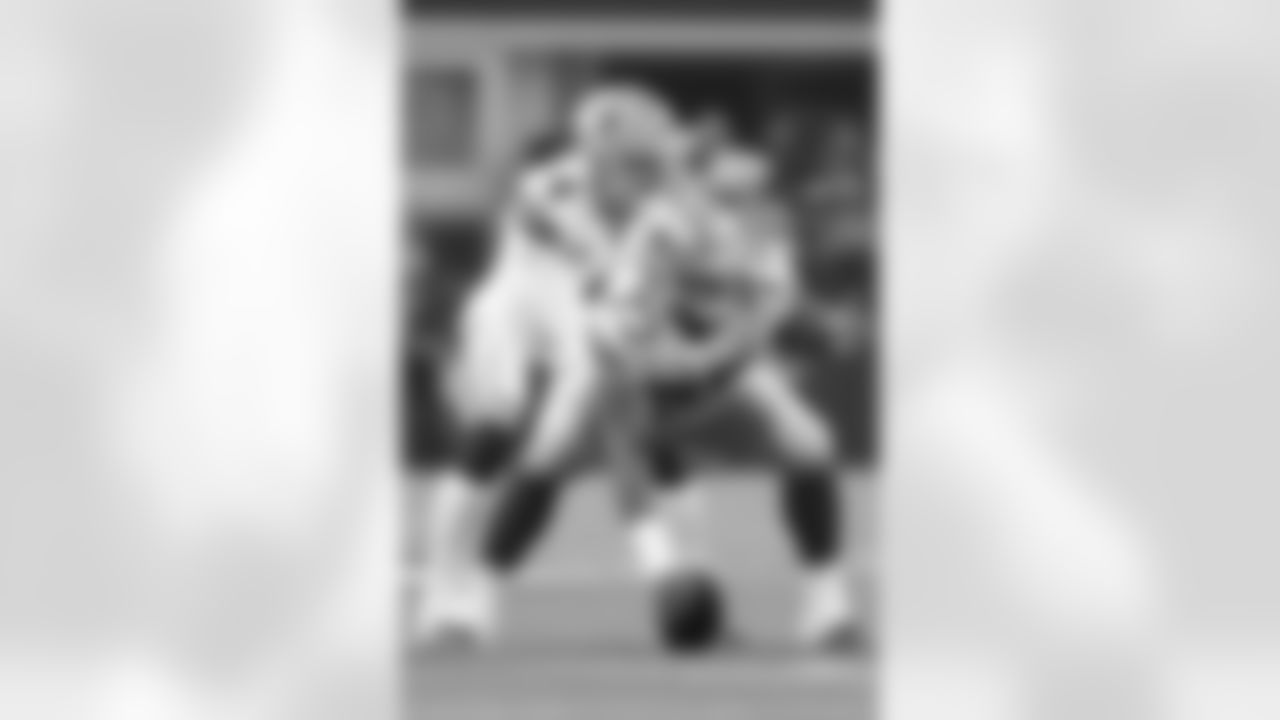 Dallas Cowboys center Joe Looney (73) prepares to snap the football to quarterback Dak Prescott (4) during a Week 14 NFL game against the Philadelphia Eagles on Sunday, Dec. 9, 2018 in Arlington, Texas. The Cowboys defeated the Eagles 29-23 in overtime. (Kevin Terrell via AP)