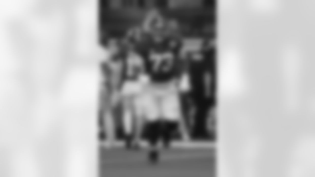 Alabama offensive lineman Evan Neal (73) jogs onto the field during the Cotton Bowl NCAA College Football Playoff semifinal game, Friday, Dec. 31, 2021, in Arlington, Texas. (AP Photo/Michael Ainsworth)