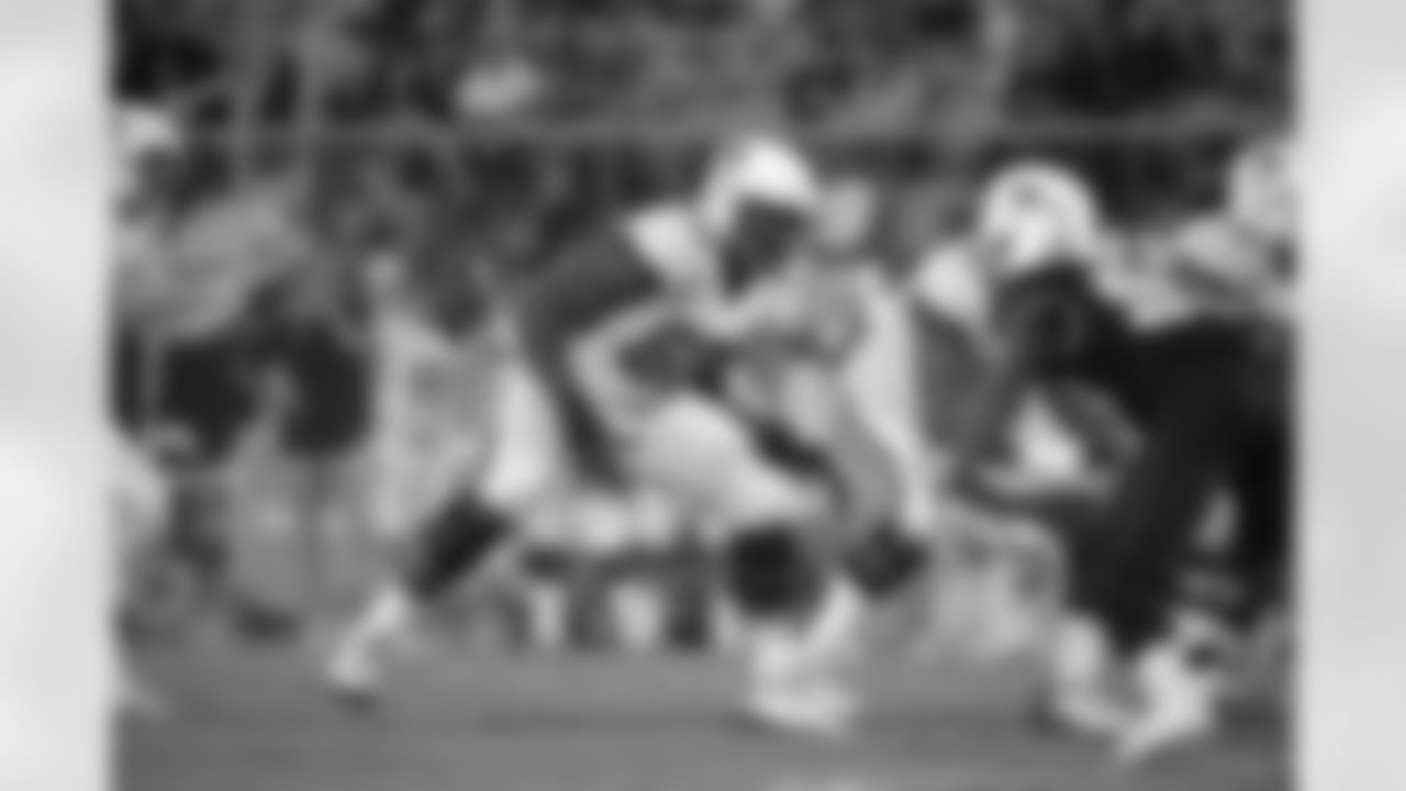 Connecticut offensive lineman Matt Peart (65) sets up to block during the second half of an NCAA college football game against Central Florida Saturday, Sept. 28, 2019, in Orlando, Fla. (AP Photo/Phelan M. Ebenhack)